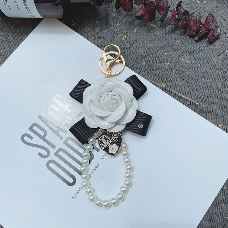 Wholesale PU Bow Camellia Keychain